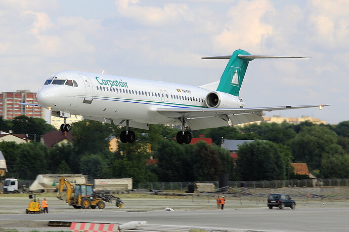 Carpatair_Fokker_F100_landing_at_Lviv_International_Airport
